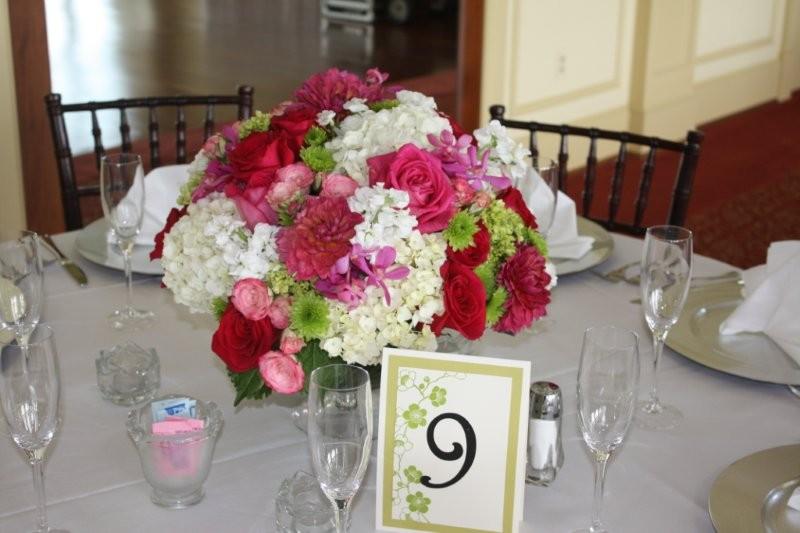 We designed huge compote bowls full of cream hydrangea hot pink roses 