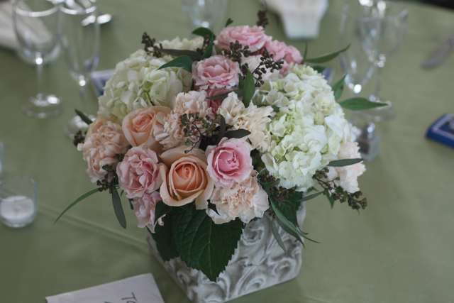 Centerpieces for this wedding were created with pink spray roses 