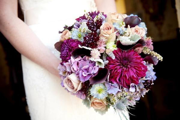 The couple chose purple and blue wedding flowers with a Jan Austin secret