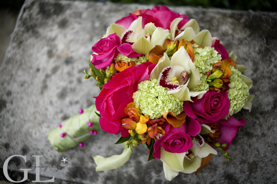 cymbidium Orchids, orange Calla Lily, green Viburnum, hot pink Peonies, Hot pink roses, Genevieve Leiper Photography