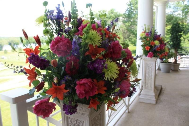 stock, phlox, peonies, orange lily, purple larkspur, green Spider Mums