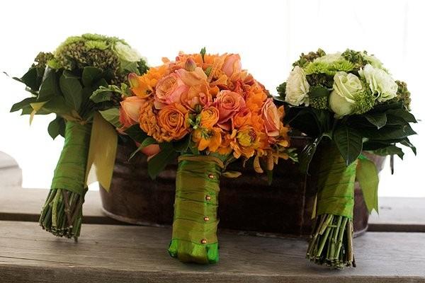 Mums, Roses, Hydrangea, Euphorbia, Celosia, tulips, orange Ranunculus, orange Star of Bethlehem, orange Roses, orange Freesia, orange Orchids