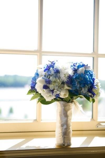 white tulips, blue hydrangea, white mini callas, white stock, blue delphinium, blue triteleia