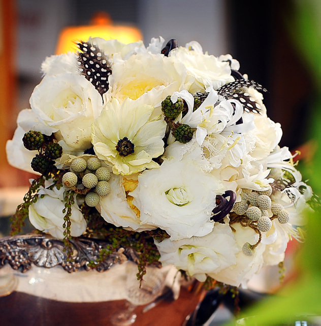 Wedding bouquet by designer Trish Van De Merkt - Chicago, Illinois, with Patience garden roses, white lisianthus, white nerine lilies, fern curls, brunia, white cosmos, black berries, peiris buds and guinea feathers