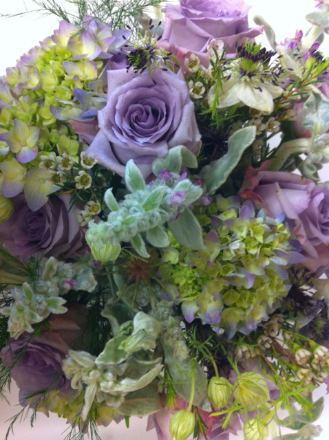 Wedding bouquet by Designer Ellen Seagraves - Bethesda, Maryland, with lavender hydrangea, lavender roses and waxflower