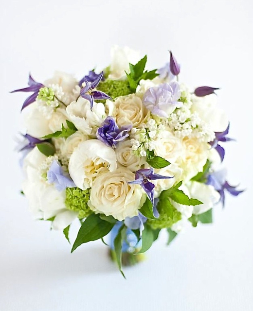 Wedding bouquet by designer Ellen Snyder of Ellen Snyder Design – Vermont, with purple clematis, lavender sweet pea, white peonies, white lilac, white roses, viburnum and mint