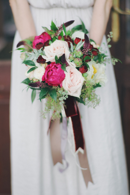 Cascading bridal bouquet by designer Olga Dudarenko of the Flower Bazar - Moscow, Russia, with pink peonies, blush garden roses and cascading ribbon