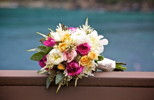 Wedding bouquet by stylist Mary Bartolucci of Island Style Weddings- St. John United States Virgin Islands, with white peonies, white astilbe, fuchsia garden roses, yellow spray roses and seeded eucalyptus