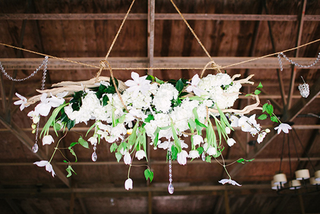 white hanging flower arrangement, hollyish