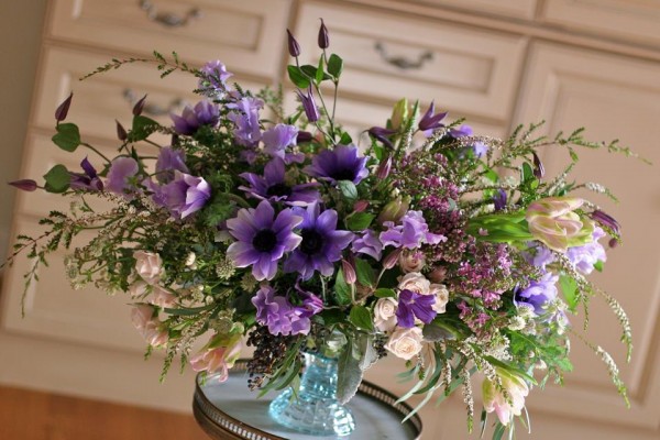 purple anemones on glass compote white magnolia designs and chapel designers