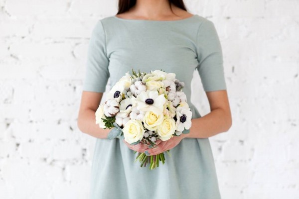 bouquet of roses and anemones flowerbazar chapel designer blue dress