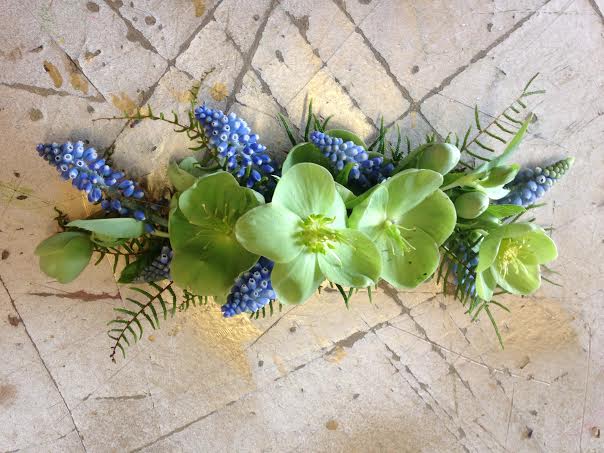 blue and green hairpiece of muscari and helebores sebesta design chapel designer