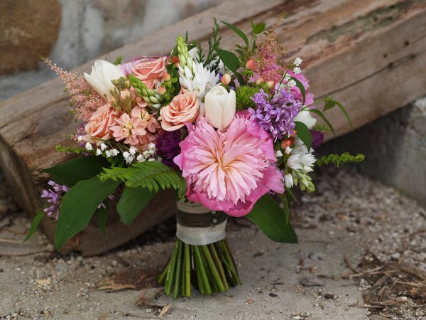 pink lavender lily of the valley roses stock